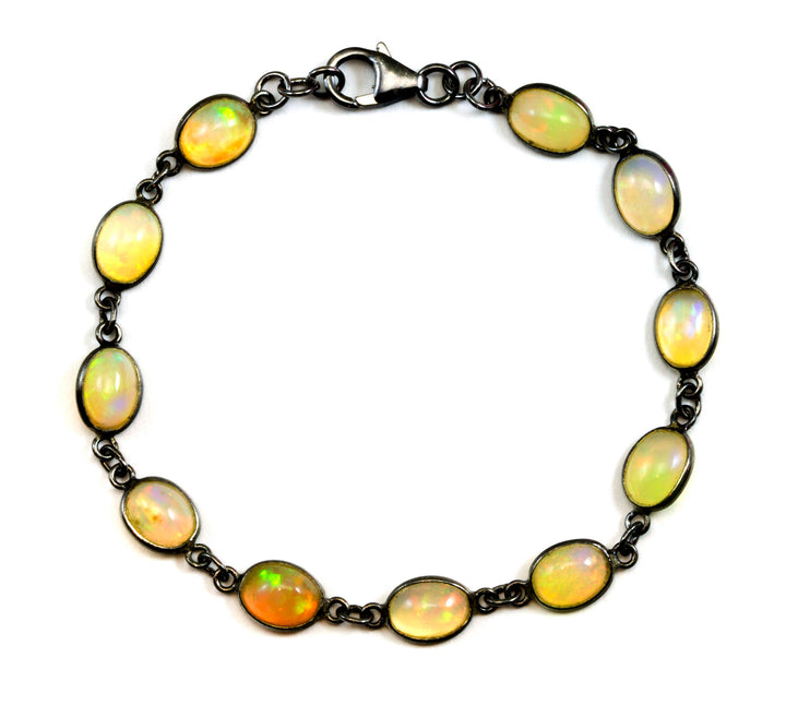 Opal Bracelet Ethopian Welo Smooth Oval Bezel Set 6.5 to 7 Inch Sterling Silver Rhodium Black Plated Adjustable Toggle Clasp Dainty Simple