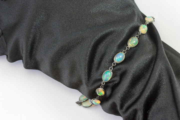 Opal Bracelet Ethopian Welo Smooth Oval Bezel Set 6.5 to 7 Inch Sterling Silver Rhodium Black Plated Adjustable Toggle Clasp Dainty Simple